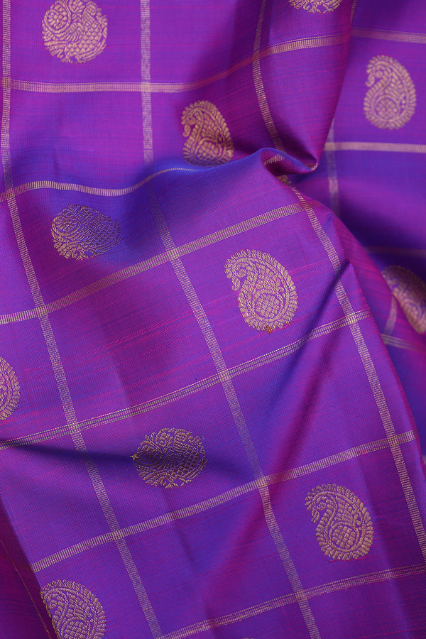 Kanchipuram Silk Saree In Purple Along Checks With Buttas