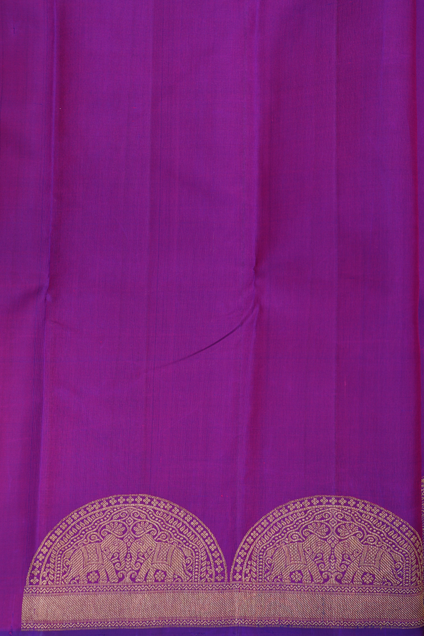 Kanchipuram Silk Saree In Purple With Floral Buttas
