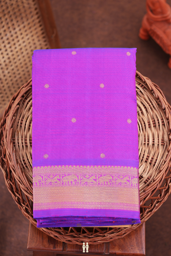Kanchipuram Silk Saree In Purple With Floral Buttis