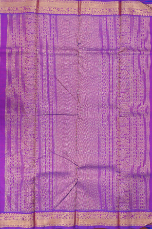 Kanchipuram Silk Saree In Purple With Floral Buttis