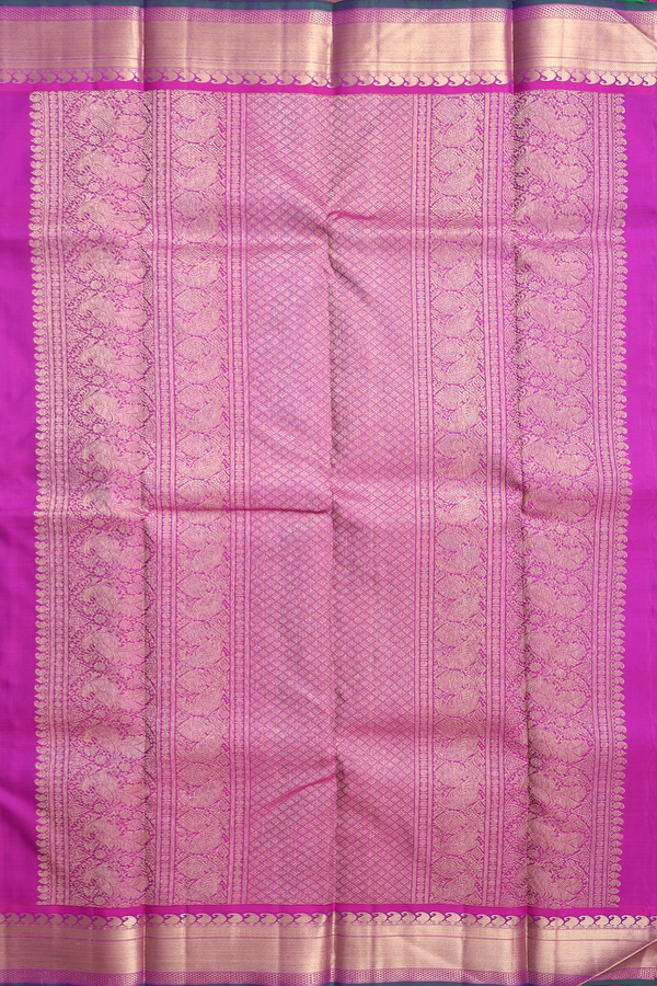 Kanchipuram Silk Saree In Purple With Floral Buttis