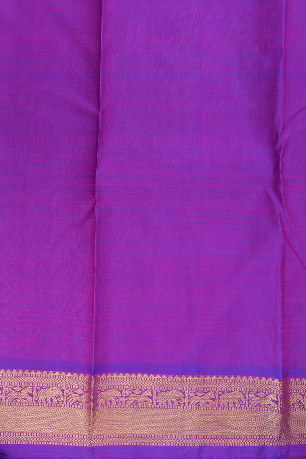 Kanchipuram Silk Saree In Purple With Floral Buttis
