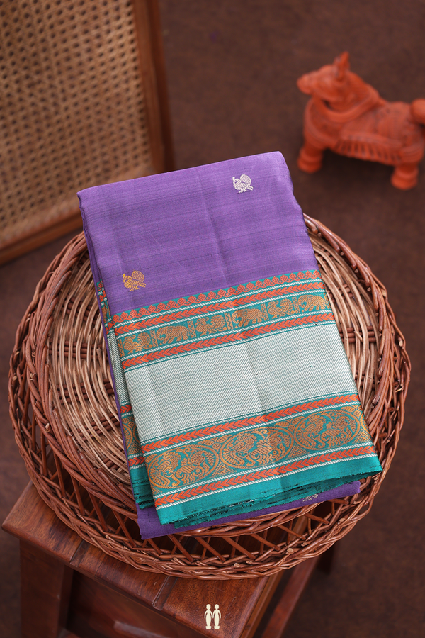 Kanchipuram Silk Saree In Purple With Peacock Buttas
