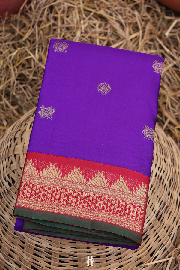 Kanchipuram Silk Saree In Purple With Peacock Buttas