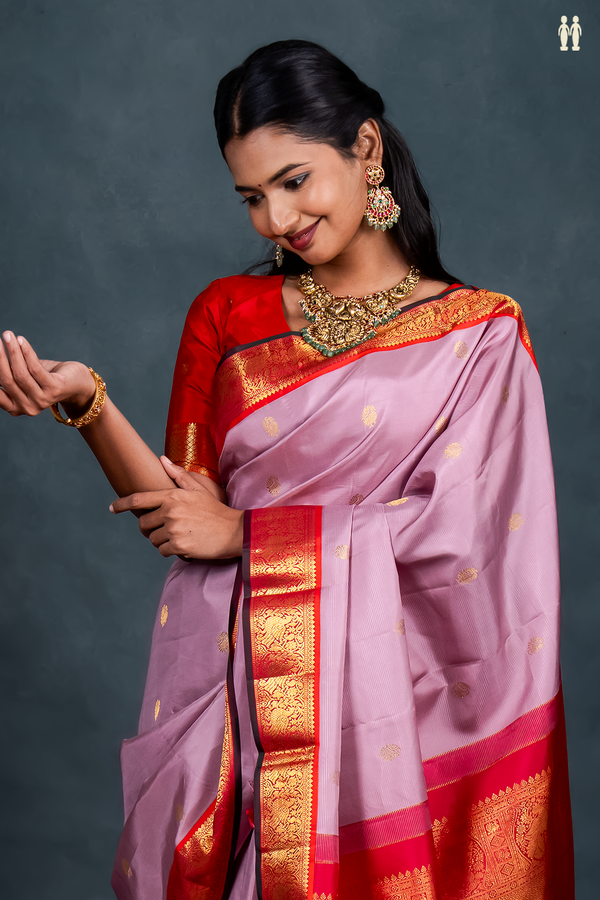 Kanchipuram Silk Saree In Purple With Peacock Buttas