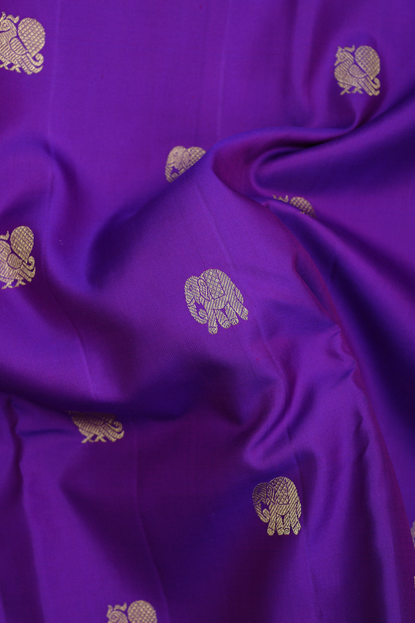 Kanchipuram Silk Saree In Purple With Peacock Elephant Buttas