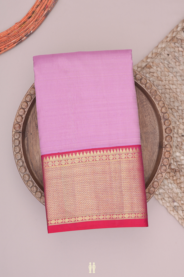 Kanchipuram Silk Saree In Purple With Self Stripes Design