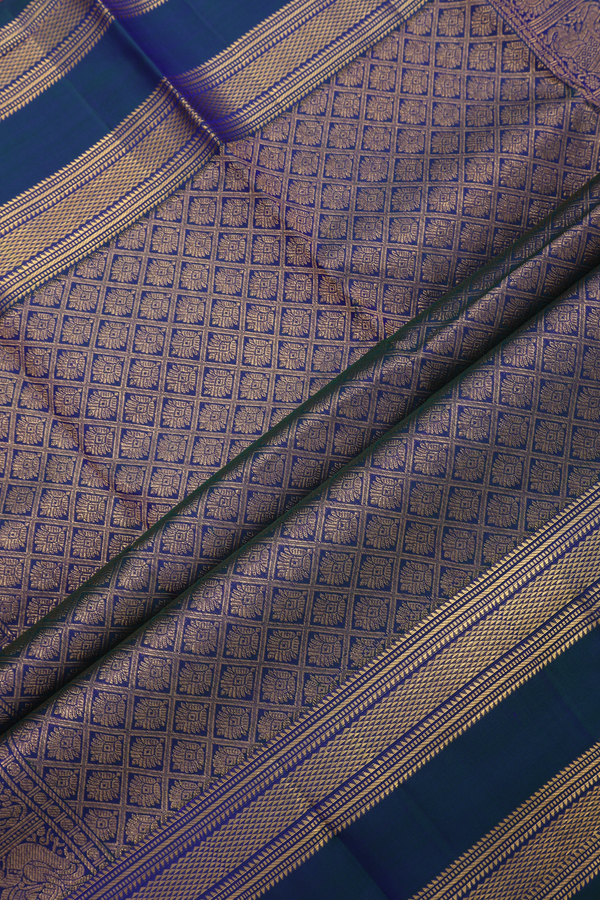 Kanchipuram Silk Saree In Purple With Zari Buttas