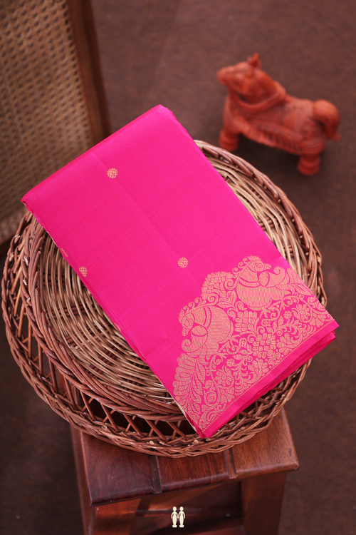 Kanchipuram Silk Saree In Rani Pink With Floral Buttas