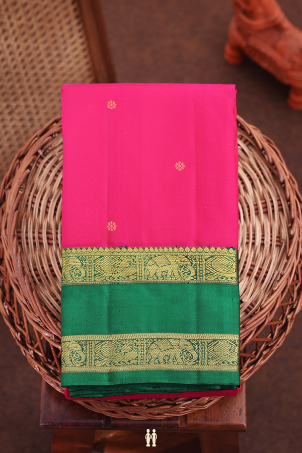 Kanchipuram Silk Saree In Rani Pink With Floral Buttas