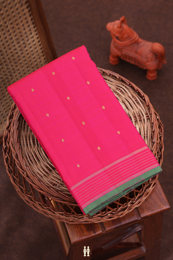 Kanchipuram Silk Saree In Rani Pink With Floral Buttis