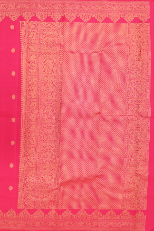 Kanchipuram Silk Saree In Rani Pink With Floral Buttas