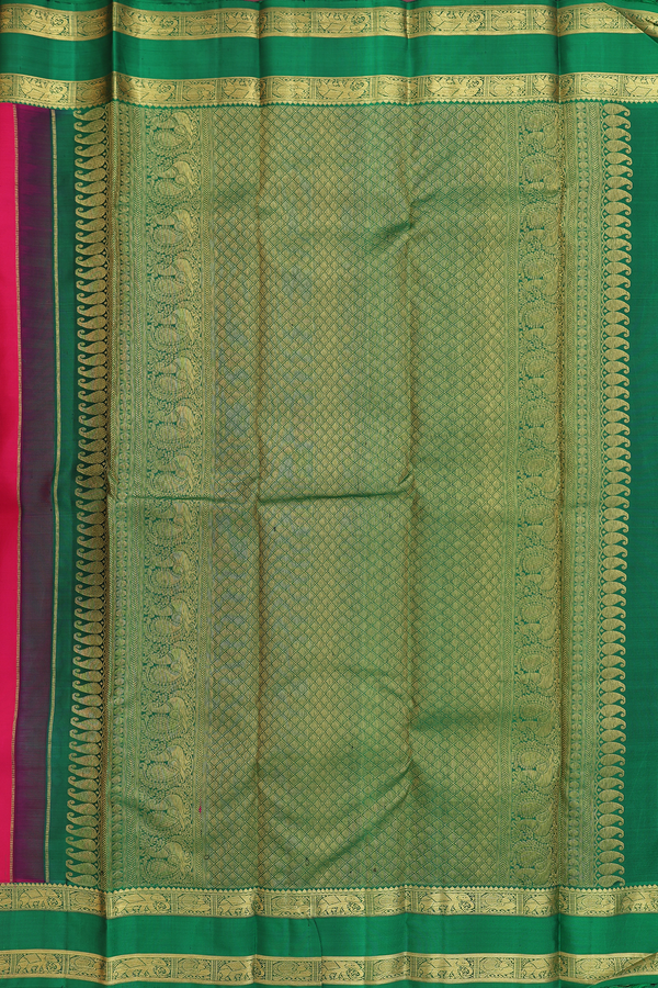 Kanchipuram Silk Saree In Rani Pink With Floral Buttas