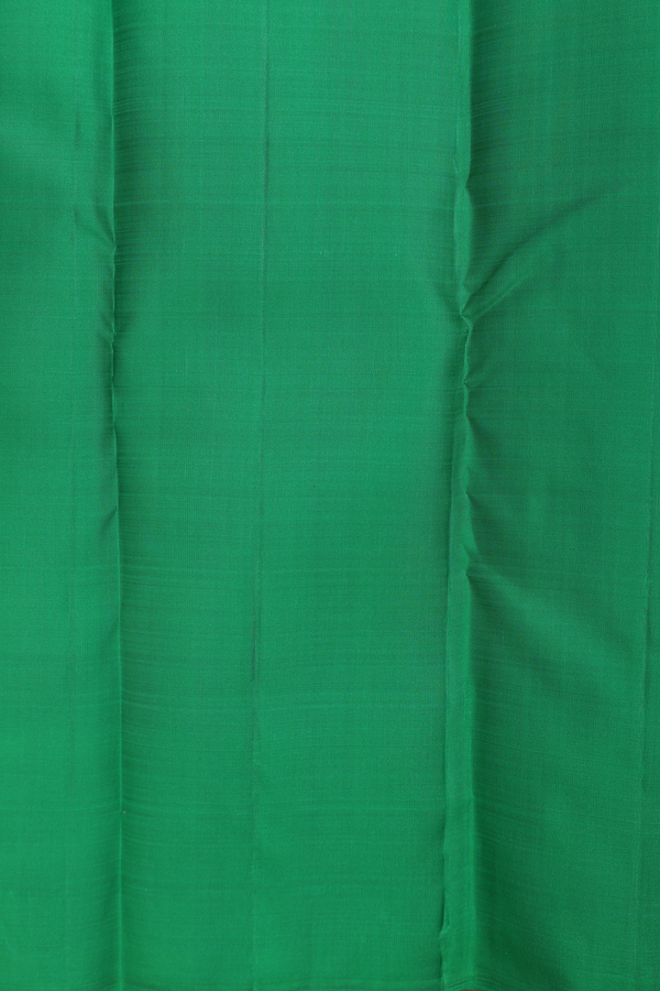 Kanchipuram Silk Saree In Rani Pink With Floral Buttas