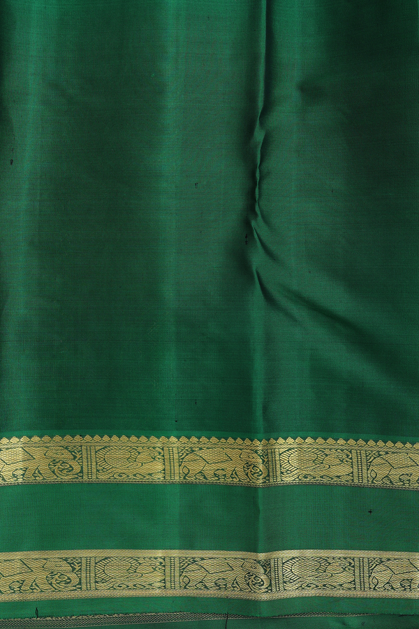 Kanchipuram Silk Saree In Rani Pink With Floral Buttas