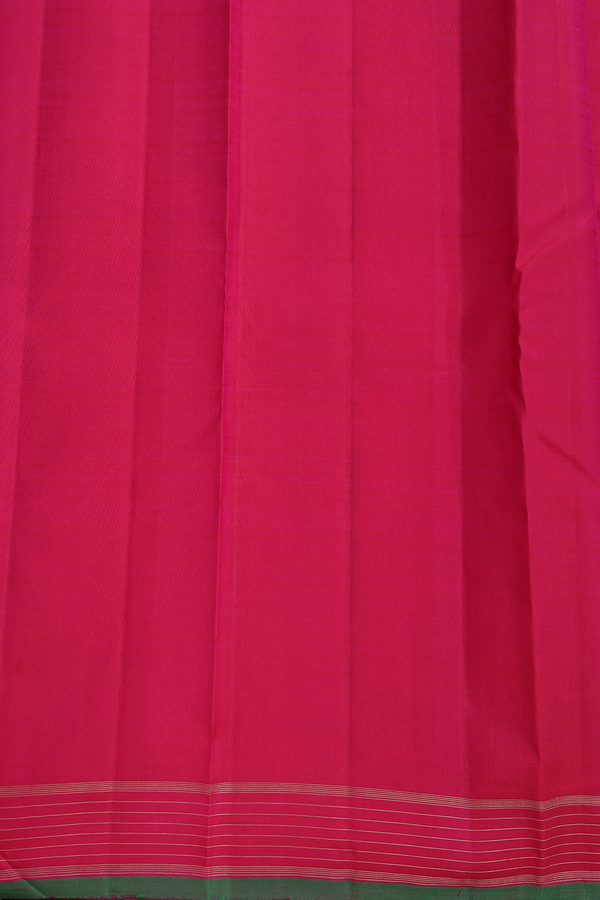 Kanchipuram Silk Saree In Rani Pink With Floral Buttis
