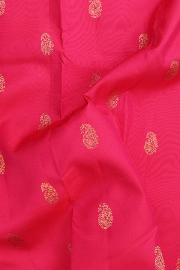 Kanchipuram Silk Saree In Rani Pink With Paisley Buttas