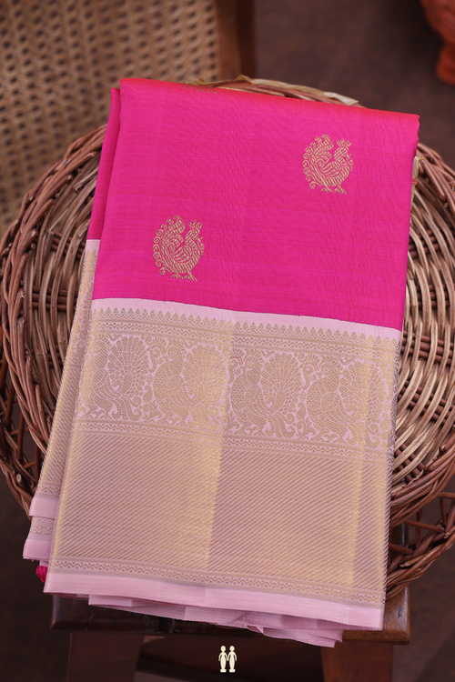 Kanchipuram Silk Saree In Rani Pink With Peacock Buttas