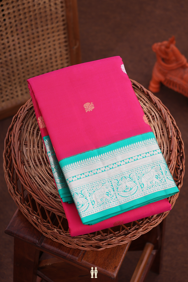 Kanchipuram Silk Saree In Rani Pink With Peacock Buttas