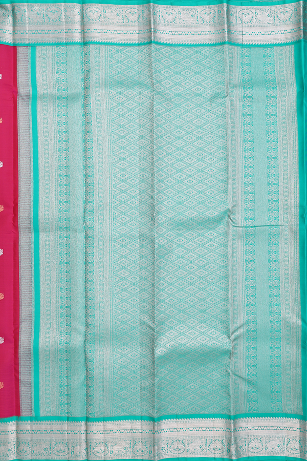 Kanchipuram Silk Saree In Rani Pink With Peacock Buttas