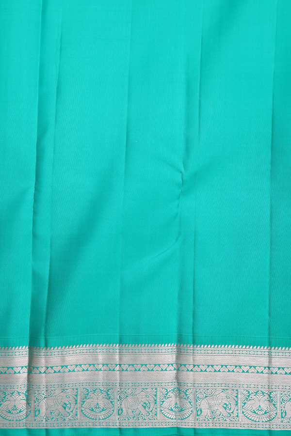Kanchipuram Silk Saree In Rani Pink With Peacock Buttas