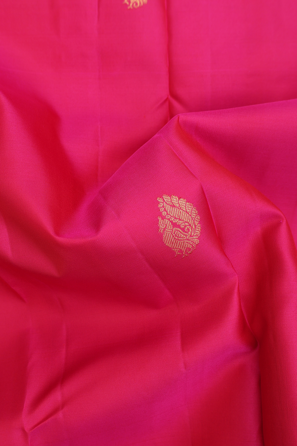 Kanchipuram Silk Saree In Rani Pink With Peacock Buttas
