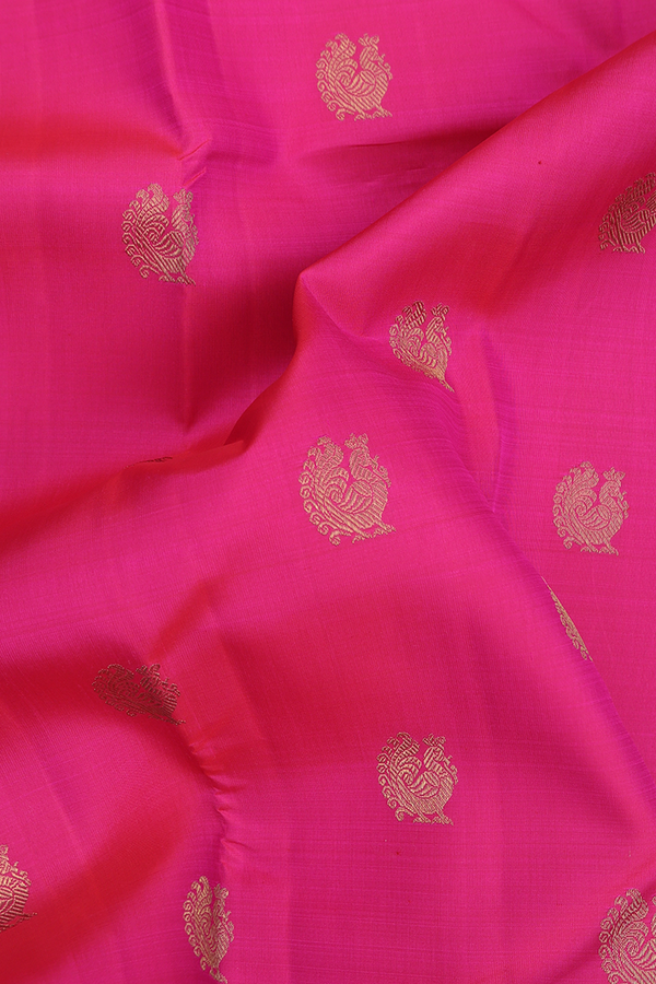 Kanchipuram Silk Saree In Rani Pink With Peacock Buttas