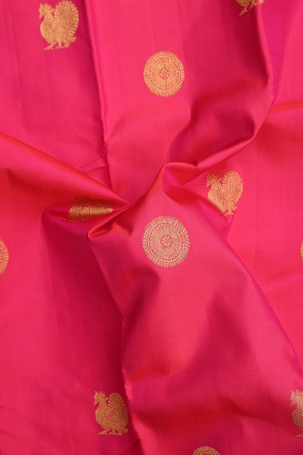 Kanchipuram Silk Saree In Rani Pink With Peacock Buttas