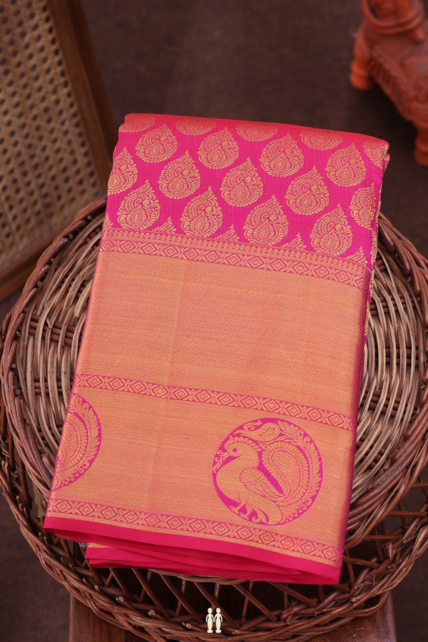 Kanchipuram Silk Saree In Rani Pink With Thilagam Buttas