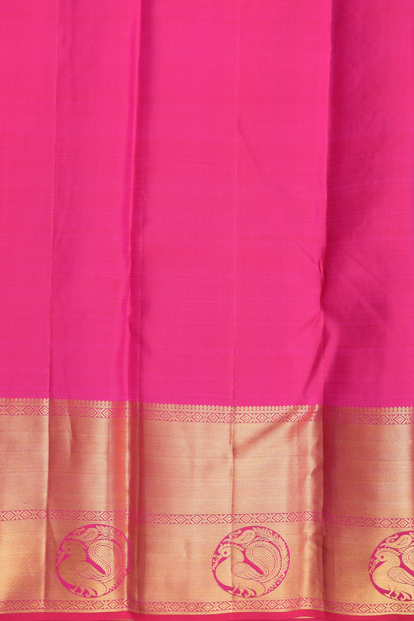 Kanchipuram Silk Saree In Rani Pink With Thilagam Buttas