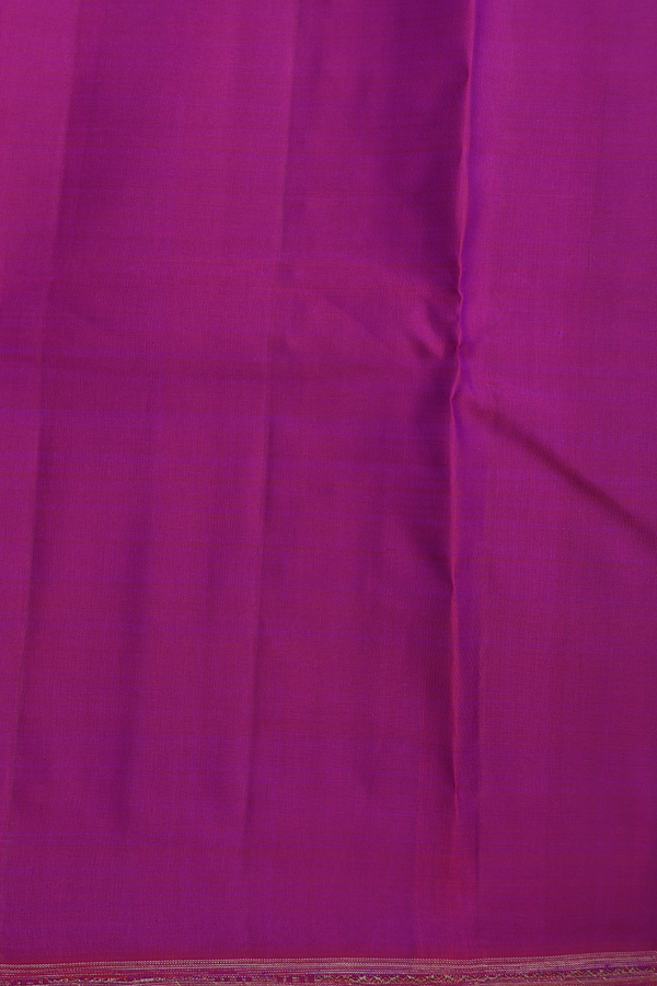 Kanchipuram Silk Saree In Regal Purple With Peacock Buttas