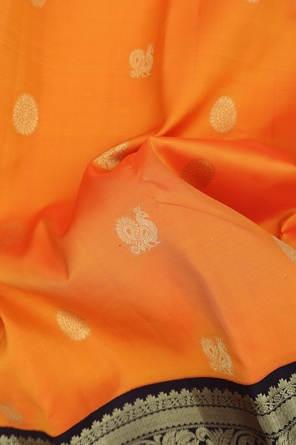 Kanchipuram Silk Saree In Royal Orange With Peacock Buttas