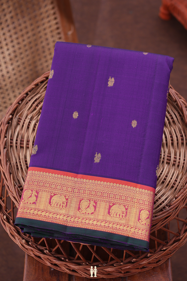 Kanchipuram Silk Saree In Royal Purple With Peacock Buttas