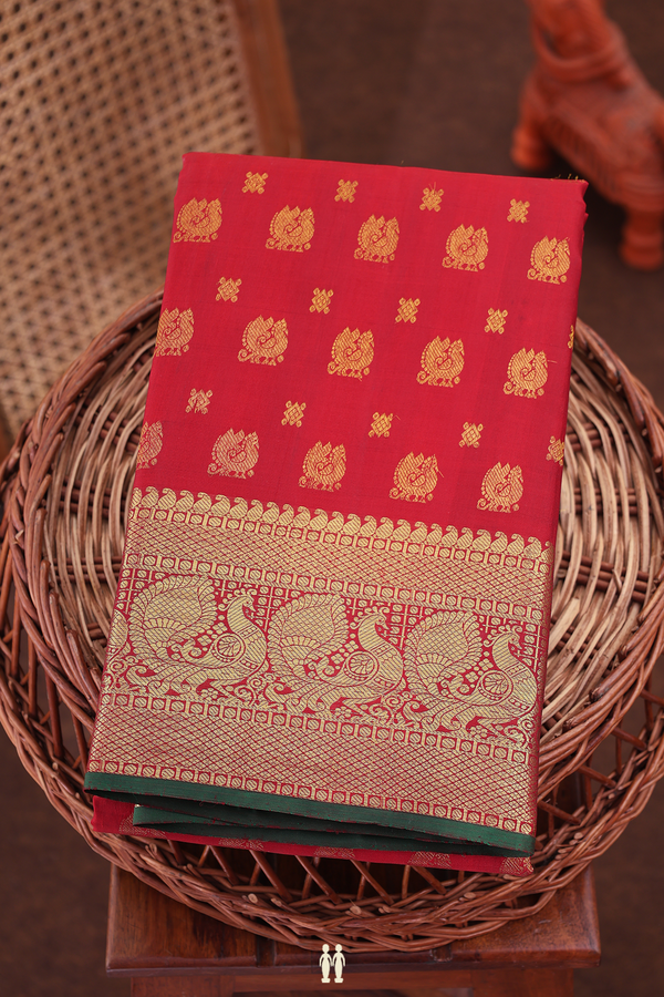 Kanchipuram Silk Saree In Ruby Red With Peacock Buttas