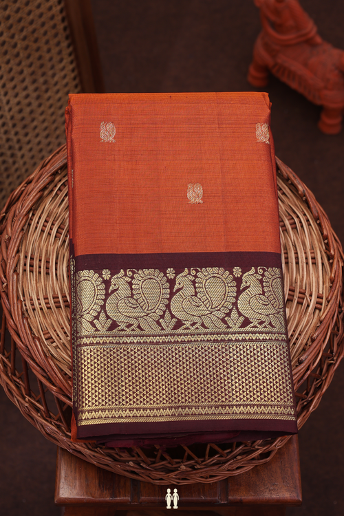 Kanchipuram Silk Saree In Rust Orange With Peacock Buttas