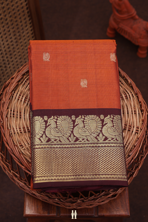 Kanchipuram Silk Saree In Rust Orange With Peacock Buttas