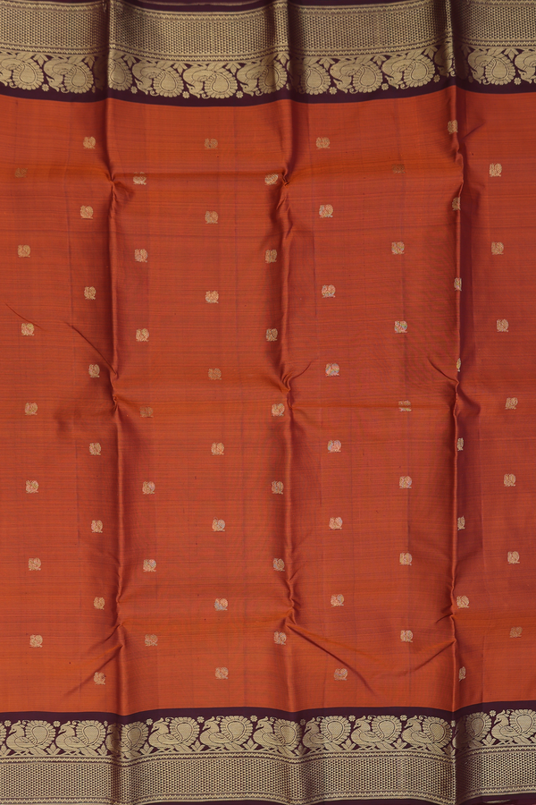 Kanchipuram Silk Saree In Rust Orange With Peacock Buttas