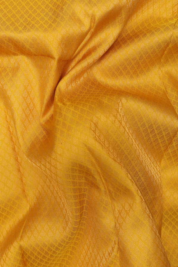 Kanchipuram Silk Saree In Saffron Yellow With Brocade Design