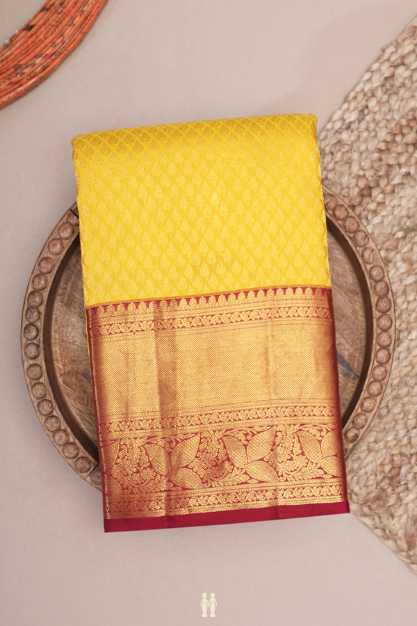 Kanchipuram Silk Saree In Saffron Yellow With Brocade Design