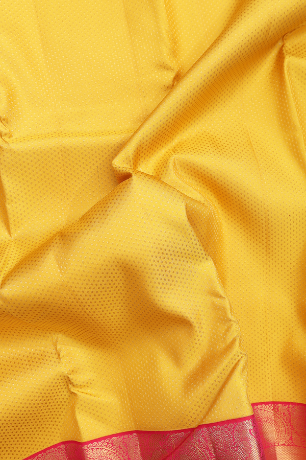 Kanchipuram Silk Saree In Saffron Yellow With Brocade Design