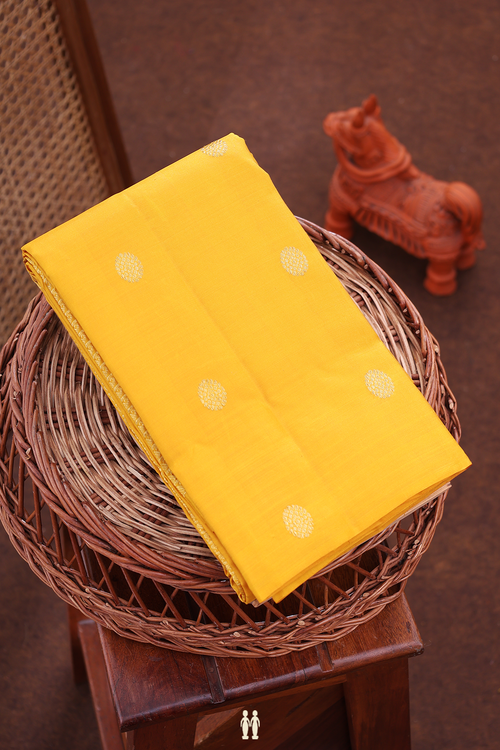 Kanchipuram Silk Saree In Saffron Yellow With Chakram Buttas