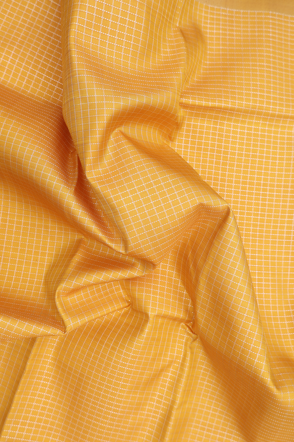 Kanchipuram Silk Saree In Saffron Yellow With Checks Design