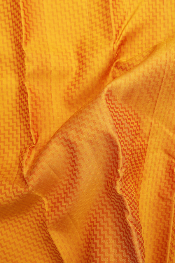 Kanchipuram Silk Saree In Saffron Yellow With Chevron Design