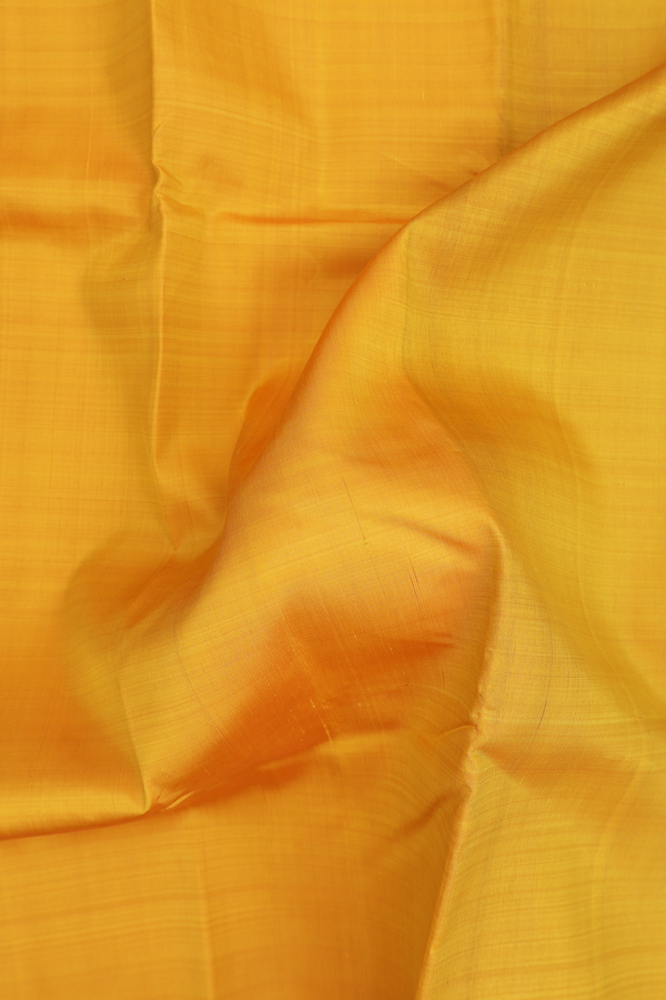 Kanchipuram Silk Saree In Saffron Yellow With Contrast Border
