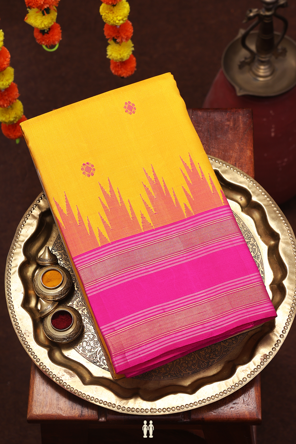 Kanchipuram Silk Saree In Saffron Yellow With Floral Buttas
