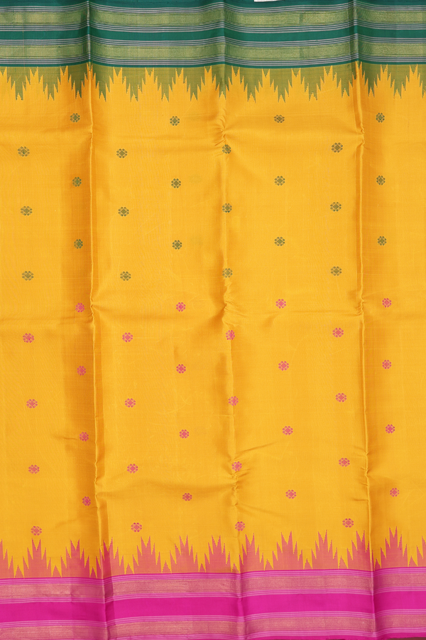 Kanchipuram Silk Saree In Saffron Yellow With Floral Buttas