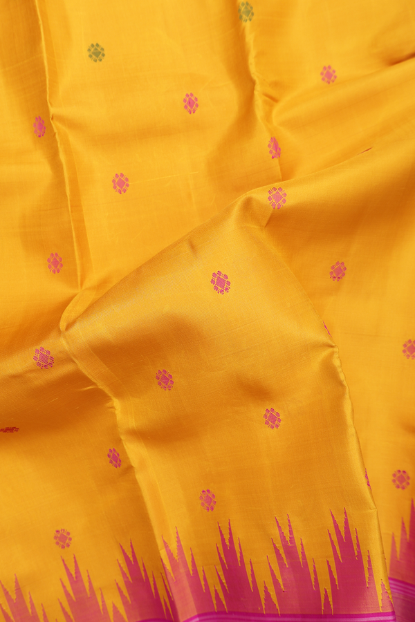 Kanchipuram Silk Saree In Saffron Yellow With Floral Buttas