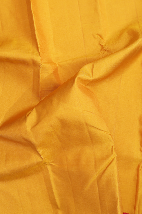 Kanchipuram Silk Saree In Saffron Yellow With Korvai Border