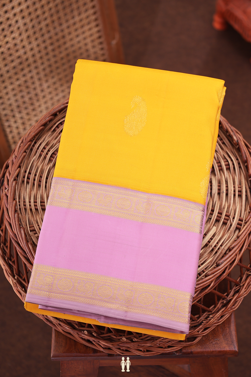 Kanchipuram Silk Saree In Saffron Yellow With Paisley Buttas