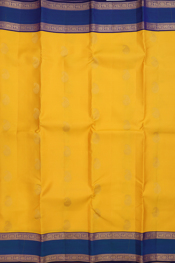 Kanchipuram Silk Saree In Saffron Yellow With Paisley Buttas